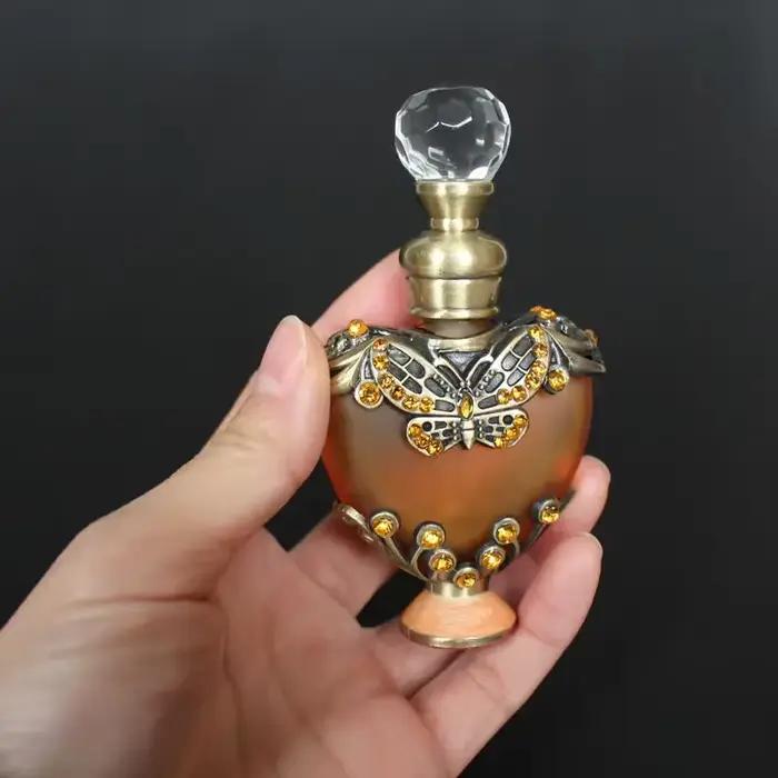 Bouteille de parfum en métal en forme de cœur Vintage de 10ml, bouteilles d'huiles essentielles élégantes, bouteille en verre artisanale avec compte-gouttes en verre