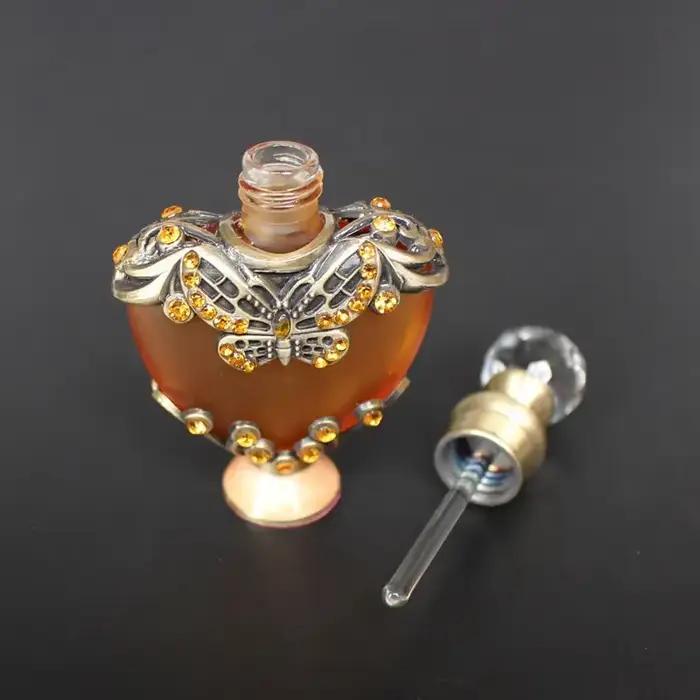 Bouteille de parfum en métal en forme de cœur Vintage de 10ml, bouteilles d'huiles essentielles élégantes, bouteille en verre artisanale avec compte-gouttes en verre