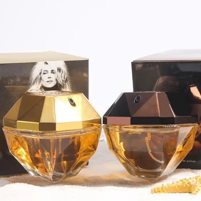 Luxueuse eau de Toilette au parfum durable. Parfum floral et fruité pour femme Golden Diamond. Spray corporel de haute qualité