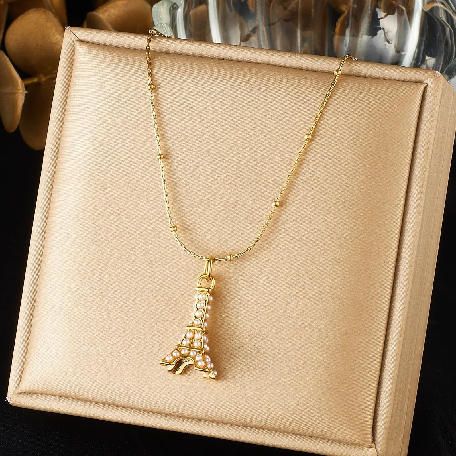 DIEYURO Collier en acier inoxydable 316L doré classique avec pendentif Tour Eiffel et perle, bijou d