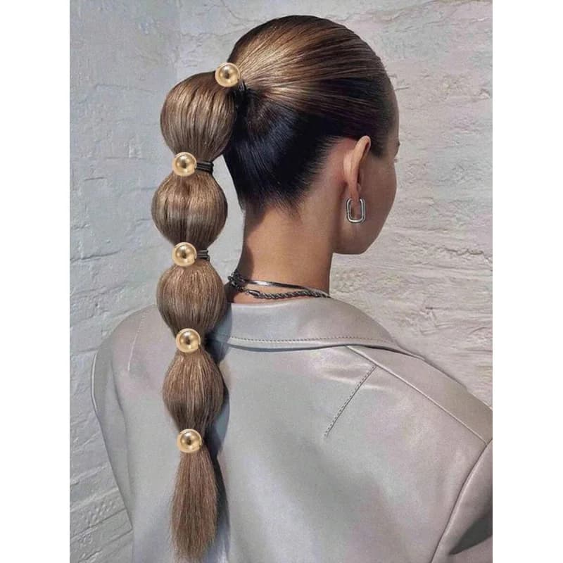5 accessoires de coiffure pour femmes en or glamour