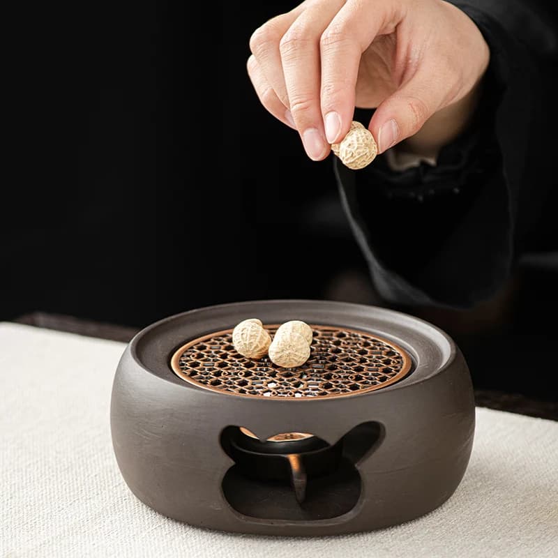Bougie multifonctionnelle en terre cuite