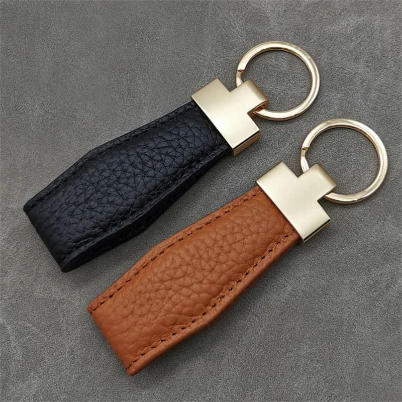 Porte-clés de luxe pour hommes et femmes, en cuir exquis, porte-clés de voiture, cadeau pour filles, accessoires masculins