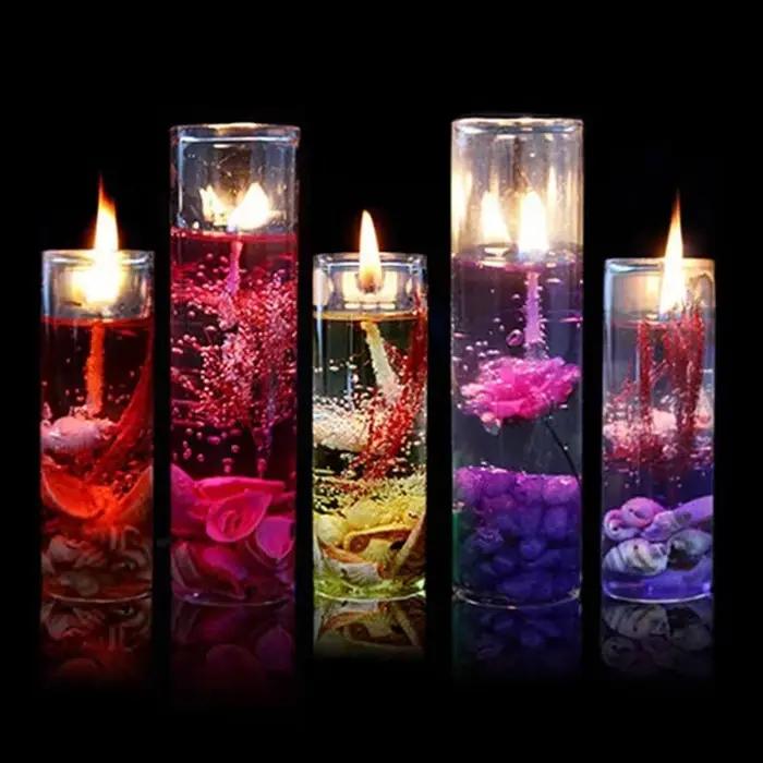 Bougie d'aromathérapie sans fumée en verre avec coquillages et détails floraux pour la décoration de maison romantique et de mariage