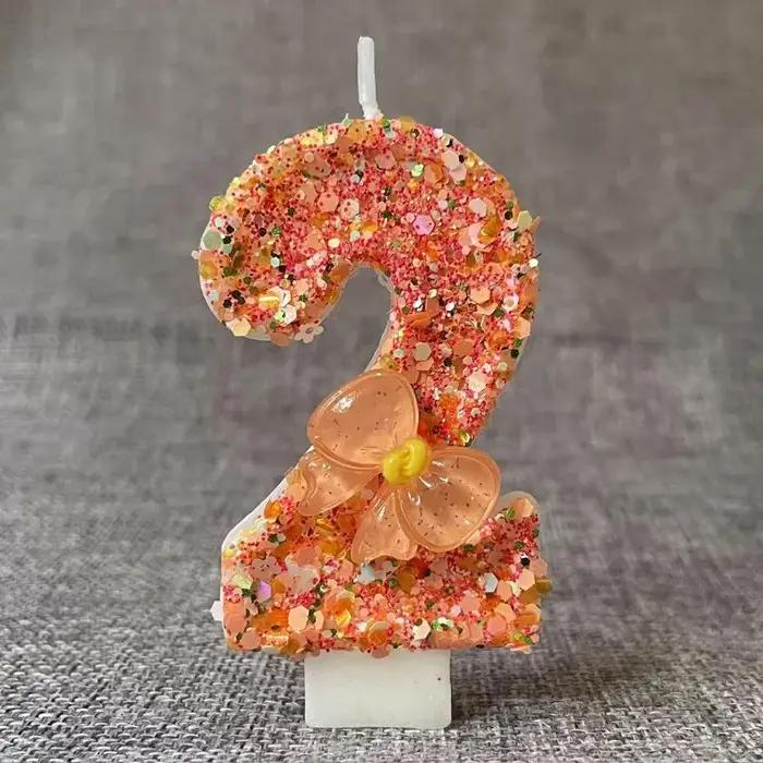 Bougie d'anniversaire avec nœud Orange