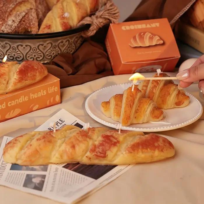 Bougie parfumée faite à la main en forme de pain factice avec parfum de gâteau