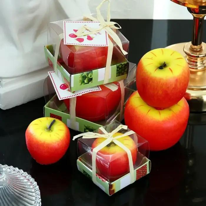 Bougie de noël en forme de pomme