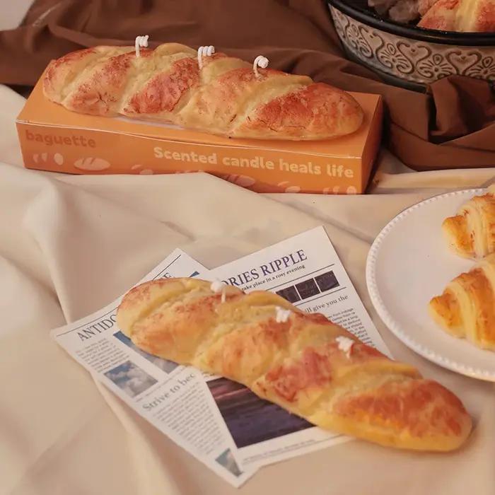 Bougie parfumée faite à la main en forme de pain factice avec parfum de gâteau