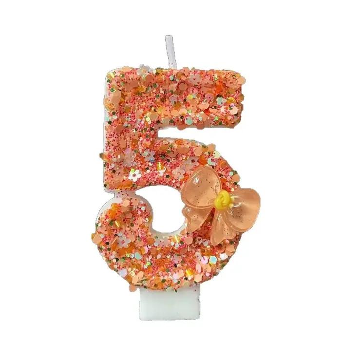 Bougie d'anniversaire avec nœud Orange