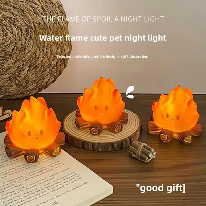 Lampe LED de Noël en forme de bougie pour feu de camp, lumière d'ambiance festive, cadeau de Noël idéal et ornement de bureau pour une ambiance festive
