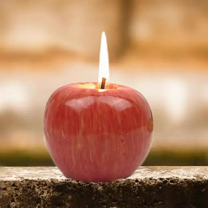 Bougie de noël en forme de pomme