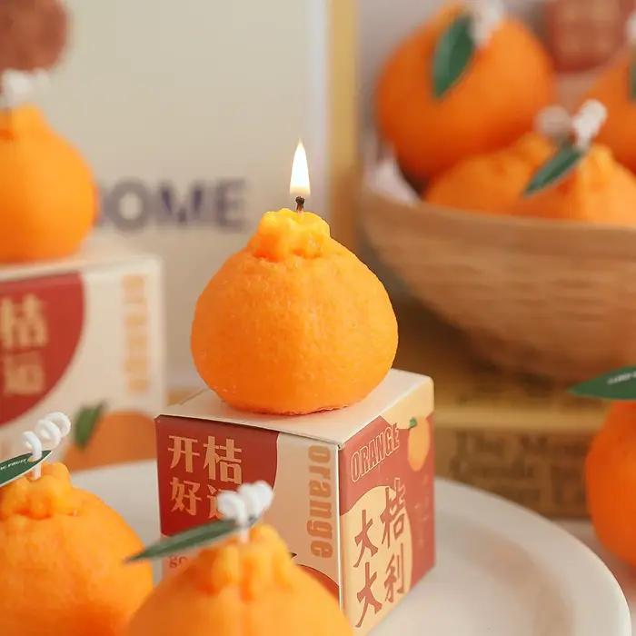 Bougie parfumée faite à la main aux fruits orange