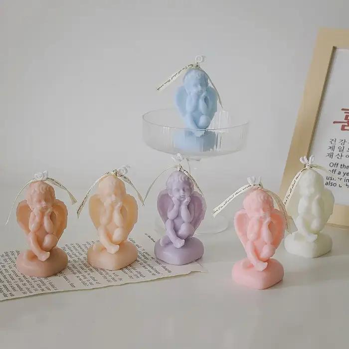 Petite statue d'ange, bougie parfumée