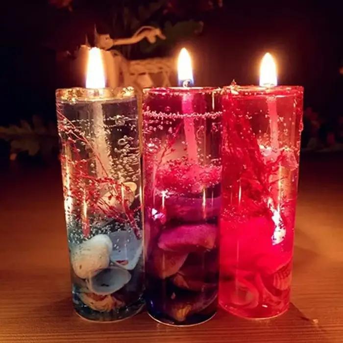 Bougie d'aromathérapie sans fumée en verre avec coquillages et détails floraux pour la décoration de maison romantique et de mariage