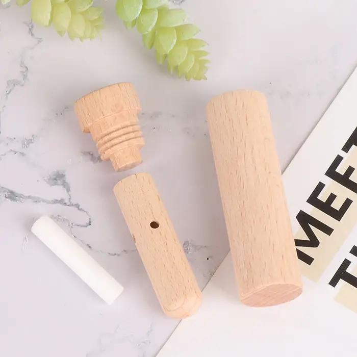 ^ Inhalateur diffuseur de bois d'arôme d'huile essentielle