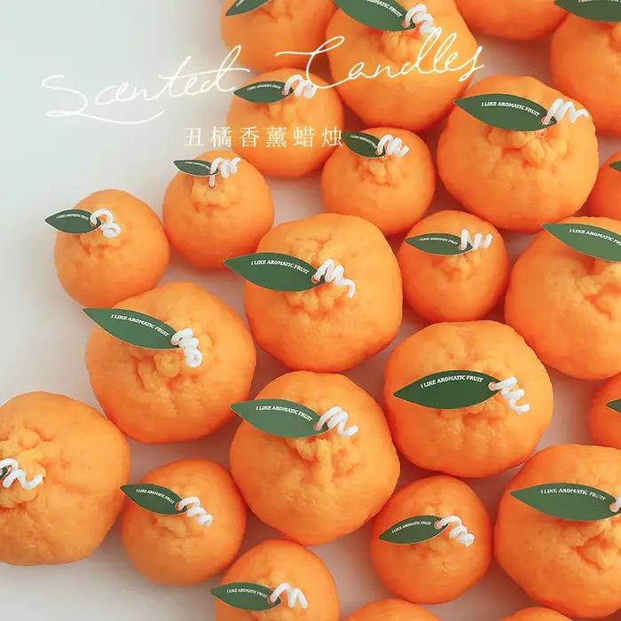 Bougie parfumée faite à la main aux fruits orange