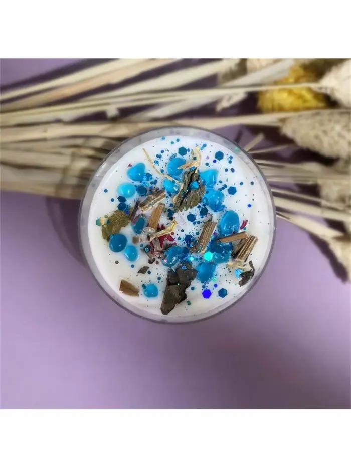 Bougie parfumée en cire de soja colorée en forme de conque, style Noël, de la collection Constellati