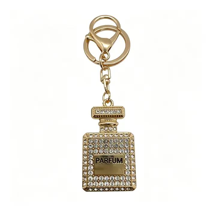  Porte-clés en forme de flacon de parfum de style coréen - Métal doré avec diamants roses, dorés et