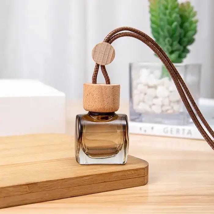 Mini diffuseur d'huiles essentielles rond pour voiture flacon vide pendentif parfum d'ambiance désodorisant ornement décoration automobile occassions spéciales femmes hommes cadeaux anniversaires noel