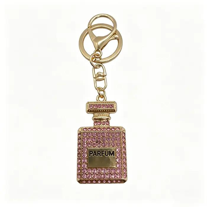  Porte-clés en forme de flacon de parfum de style coréen - Métal doré avec diamants roses, dorés et blancs - Pour clés et sacs, accessoire cadeau idéal