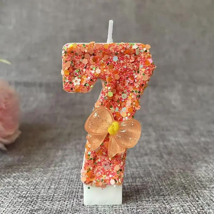 Bougie d'anniversaire avec nœud Orange