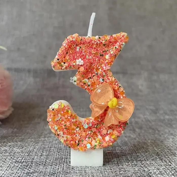 Bougie d'anniversaire avec nœud Orange