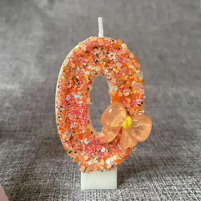 Bougie d'anniversaire avec nœud Orange