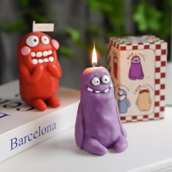 Bougie d'aromathérapie artisanale en forme de monstre de la Terre mignon