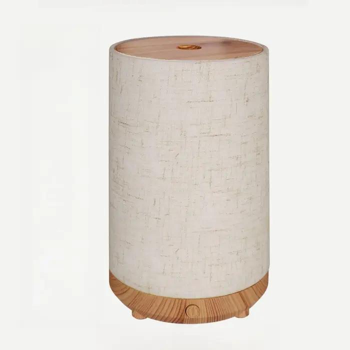 Diffuseur d'huiles essentielles nouvelle génération 2026 pour la maison avec housse en tissu, diffuseur électrique ultrasonique compact avec lumière 8 couleurs