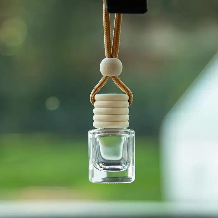 Mini diffuseur d'huiles essentielles rond pour voiture flacon vide pendentif parfum d'ambiance désodorisant ornement décoration automobile occassions spéciales femmes hommes cadeaux anniversaires noel
