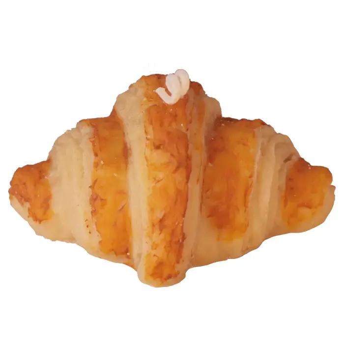 Bougie parfumée faite à la main en forme de pain factice avec parfum de gâteau