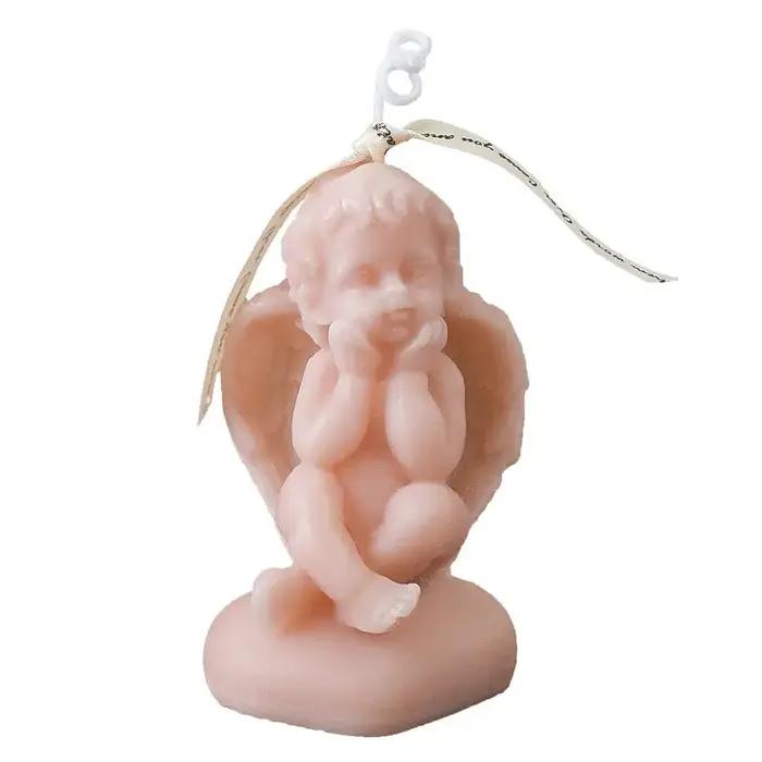 Petite statue d'ange, bougie parfumée
